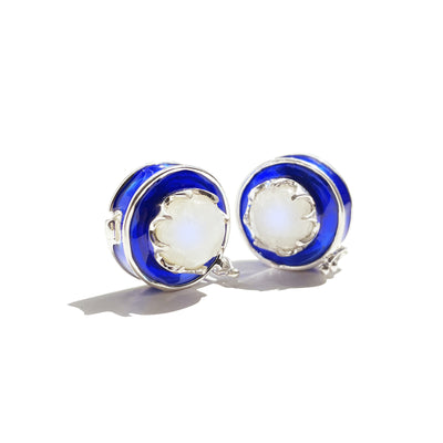 A pair of Blue enamel and moonstone button covers in sterling silver